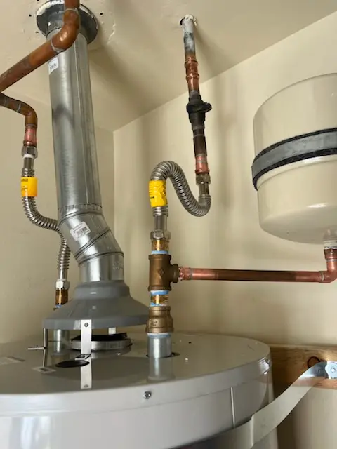 Water heater installation and plumbing repair in City Square